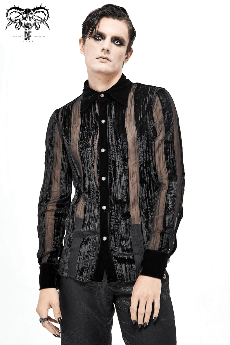 Wrist and sleeve detail of black velvet gothic shirt showing cuff opening and sheer fabric transparency