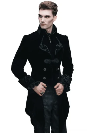 Black velvet gothic steampunk tailcoat front three-quarter view with embroidered trims and metal buttons on male model