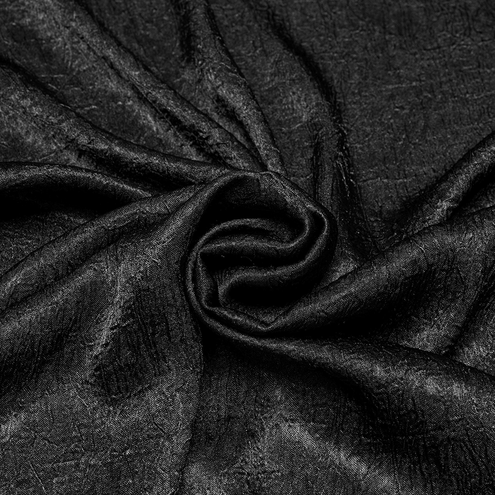 Black Victorian gothic men's shirt displaying lace patchwork and engraved buttons on dark fabric