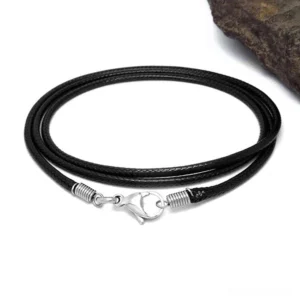 Black wax rope necklace overhead flat lay view displaying lobster claw clasp and solid cord construction