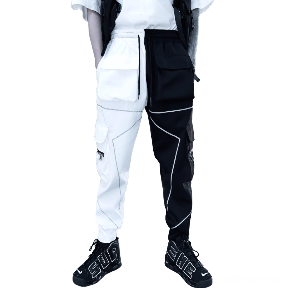 Black and white dual-tone gothic cargo pants side front view with reflective trim and zippered pockets