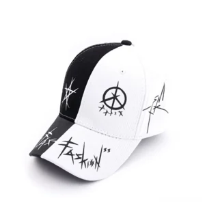 Black and white patchwork gothic baseball cap with matching graffiti punk prints on two-tone panels, side angle view