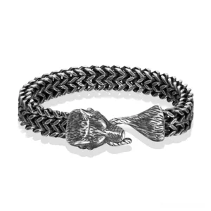 Black wolf head gothic chain bracelet flat view – stainless steel wheat-link design with detailed clasp