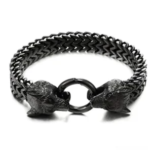 Black wolf head stainless steel gothic bracelet overhead flat lay view with wheat chain design