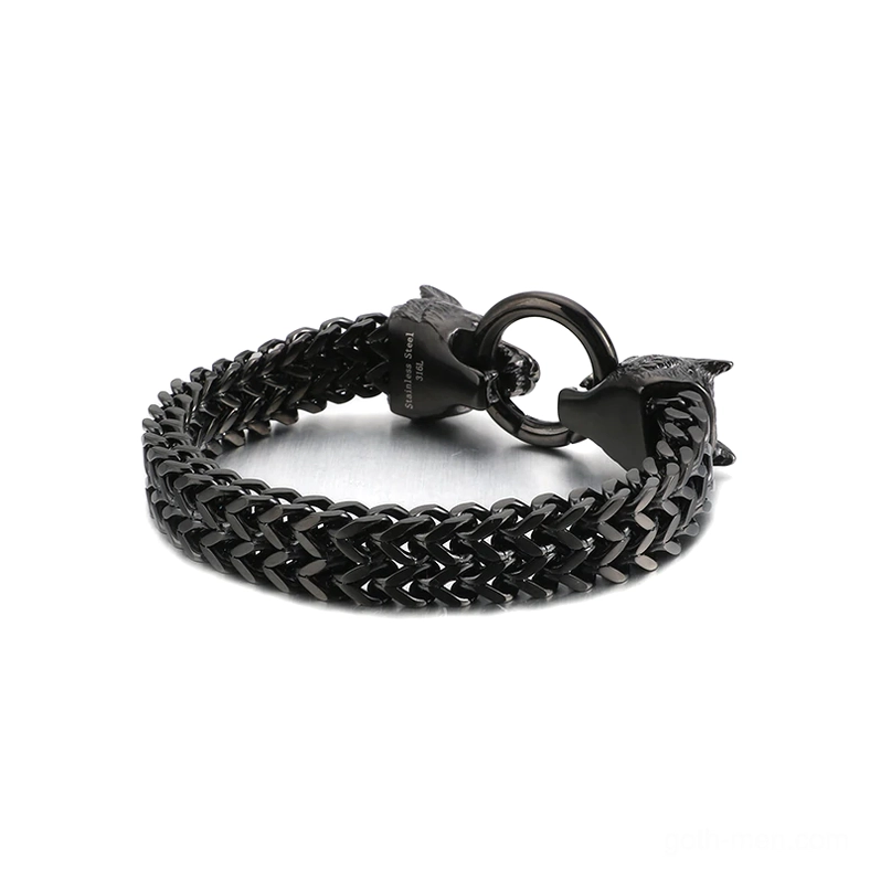 Black stainless steel wolf head gothic bracelet rear overhead view thick woven chain texture