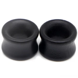 Black wood tunnel earrings side angle showing hollow center and matte finish details