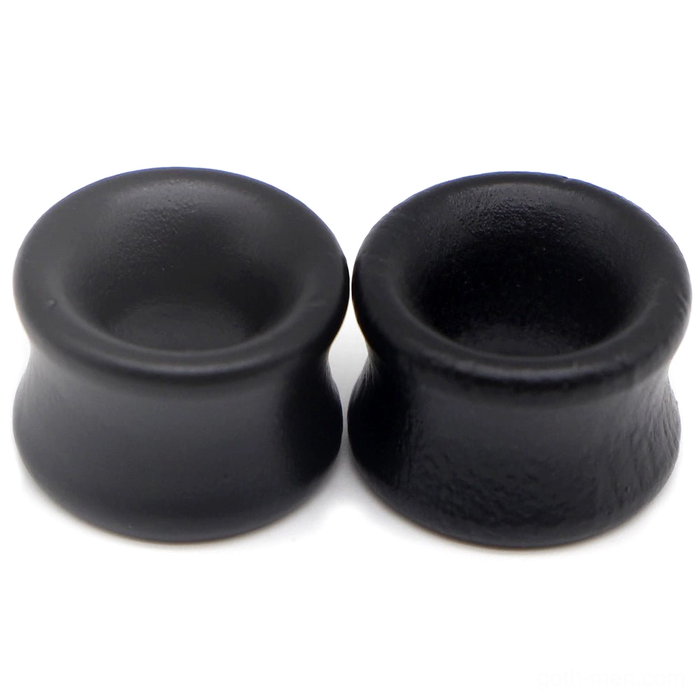 Black wood tunnel earrings side angle showing hollow center and matte finish details