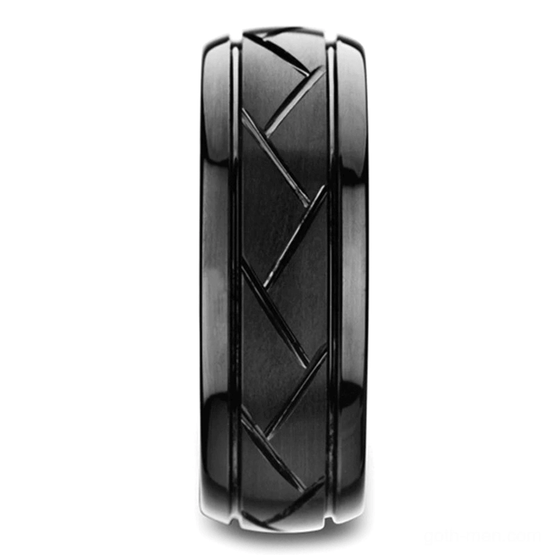 Black metal zigzag gothic ring front facing view, showing detailed chevron engraved texture and polished edges