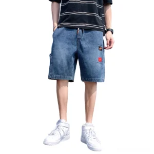 Deep blue loose denim shorts for men featuring side print details and classic denim finish, front flat lay view