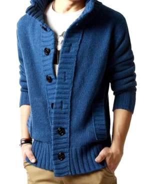 Deep blue knitted gothic cardigan with mandarin collar, side pockets, and single breasted closure on male model, alternative fashion style