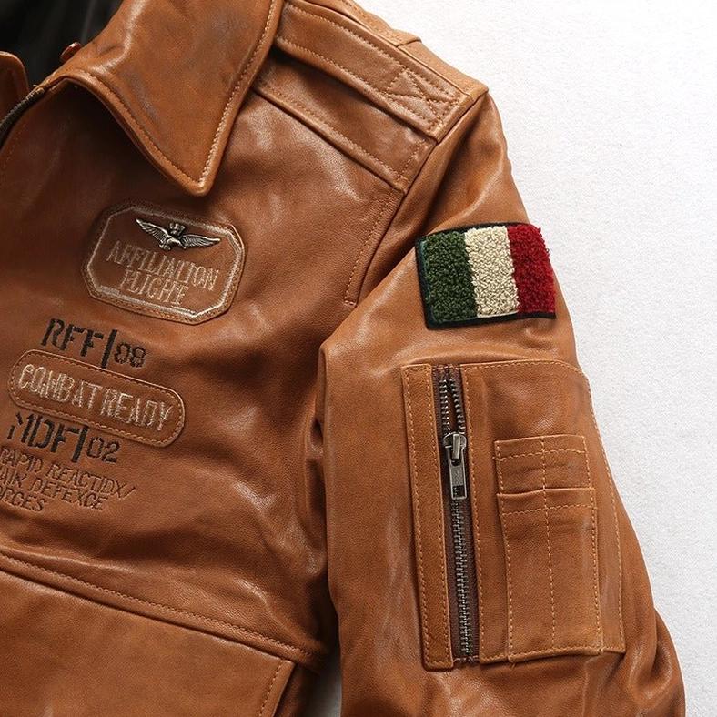 Gothic bomber shoulder patch close-up featuring embroidered insignias and military-style national flag detail