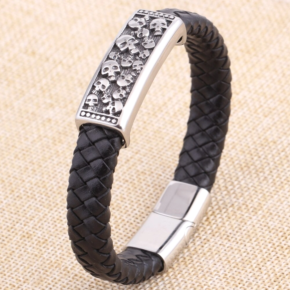 Braided black leather gothic skull bracelet with embossed silver metal plate and stainless steel magnetic clasp