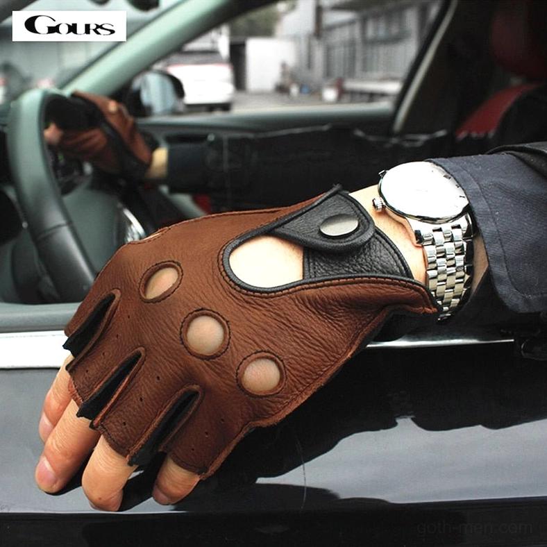 Brown deerskin fingerless gloves with perforated holes worn on male hand with wristwatch, outdoor car detail