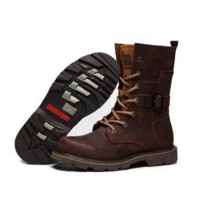 Brown distressed leather combat boots with rubber lug tread sole, showing outsole and distressed texture detail