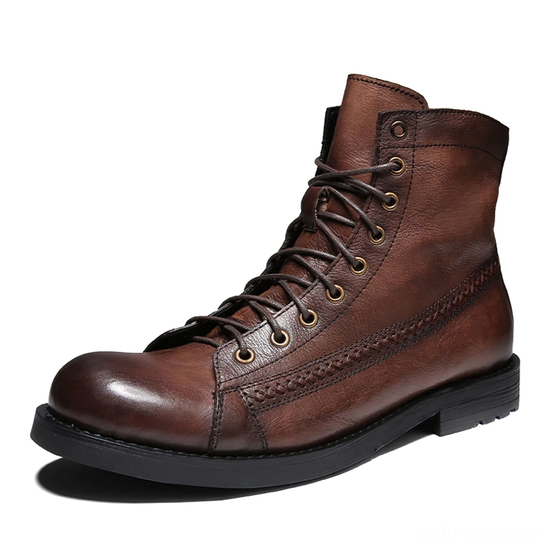 Brown vintage lace-up ankle boots for men featuring worn leather finish and classic structure