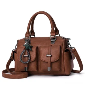 Brown gothic vintage leather shoulder bag with star pendant charm and multiple compartments – earthy romantic tote