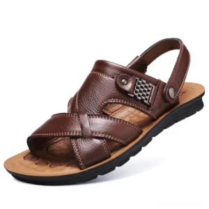 Dark brown pebbled leather gothic sandals with adjustable back strap, three-quarter view
