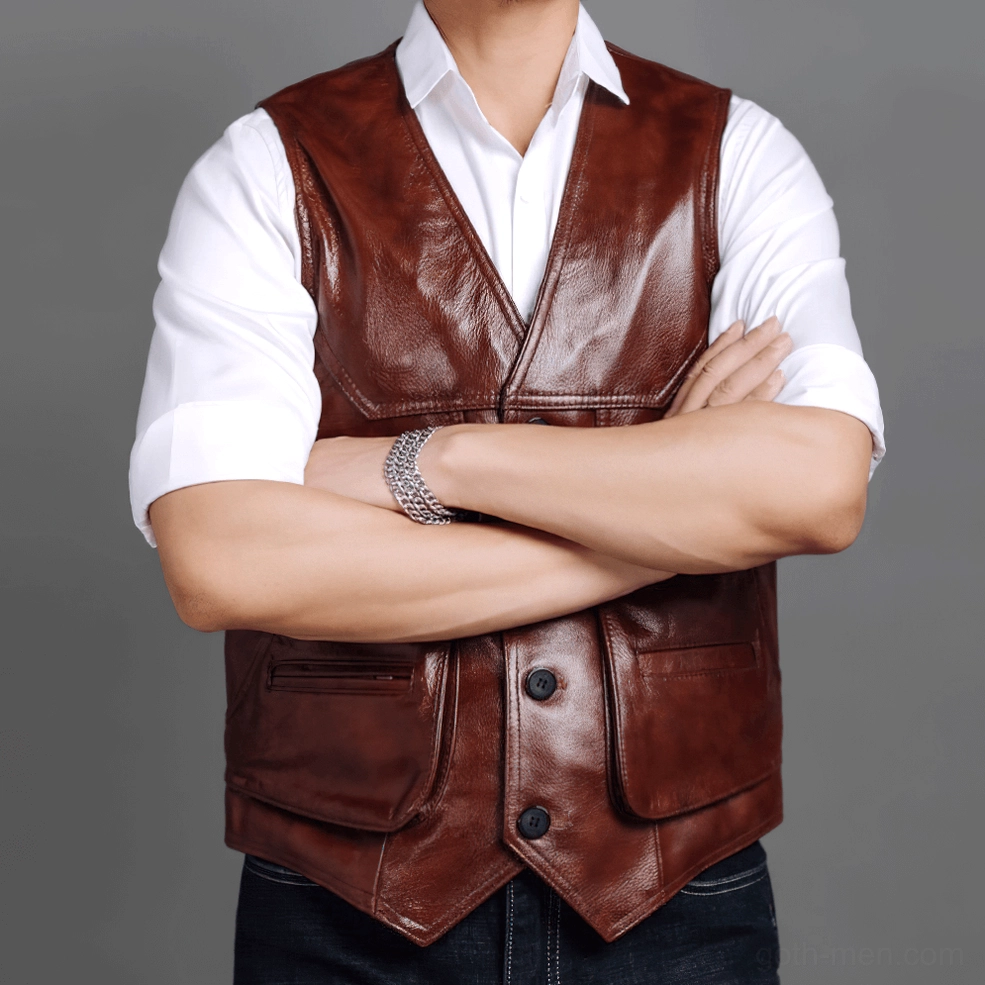 Brown genuine leather gothic biker vest worn by male model with crossed arms, front full view with button closure