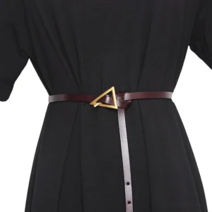 Deep brown vegan leather gothic belt with gold triangle buckle, waist styling on mannequin in studio lighting