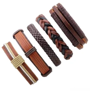 5-piece brown leather gothic bracelet collection flat lay dispersed showing individual styles adjustable rope closures alternative fashion accessories
