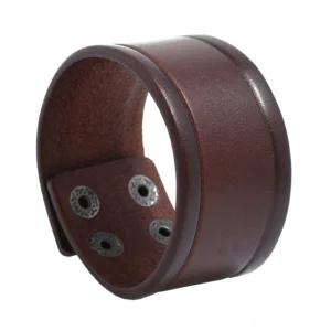Brown wide genuine leather gothic cuff bracelet with layered leather trim detail, front three-quarter view