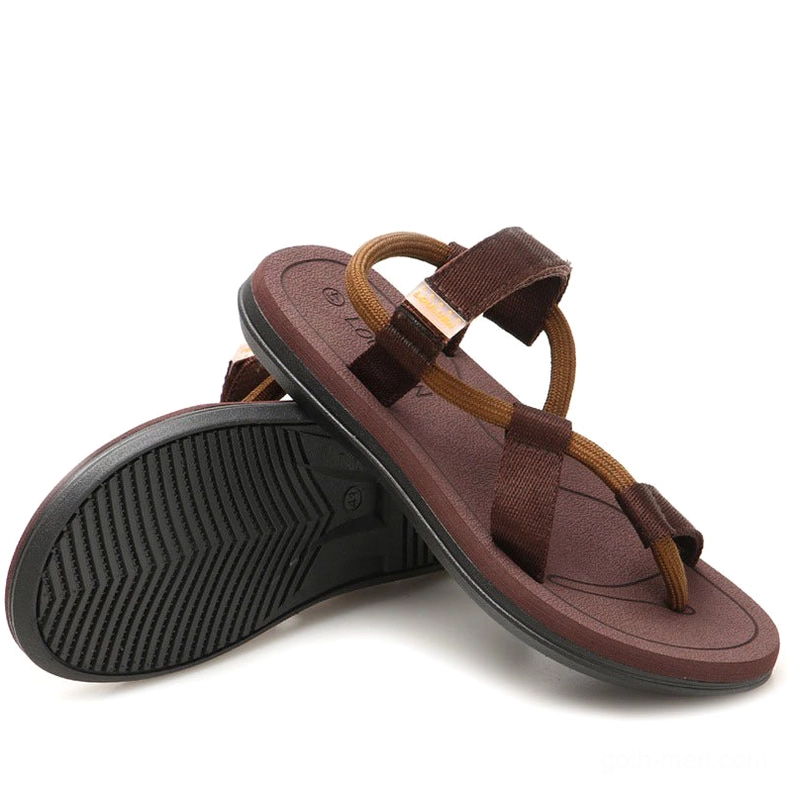 Brown two-tone gothic sandals stacked display showing craftsmanship and design detail