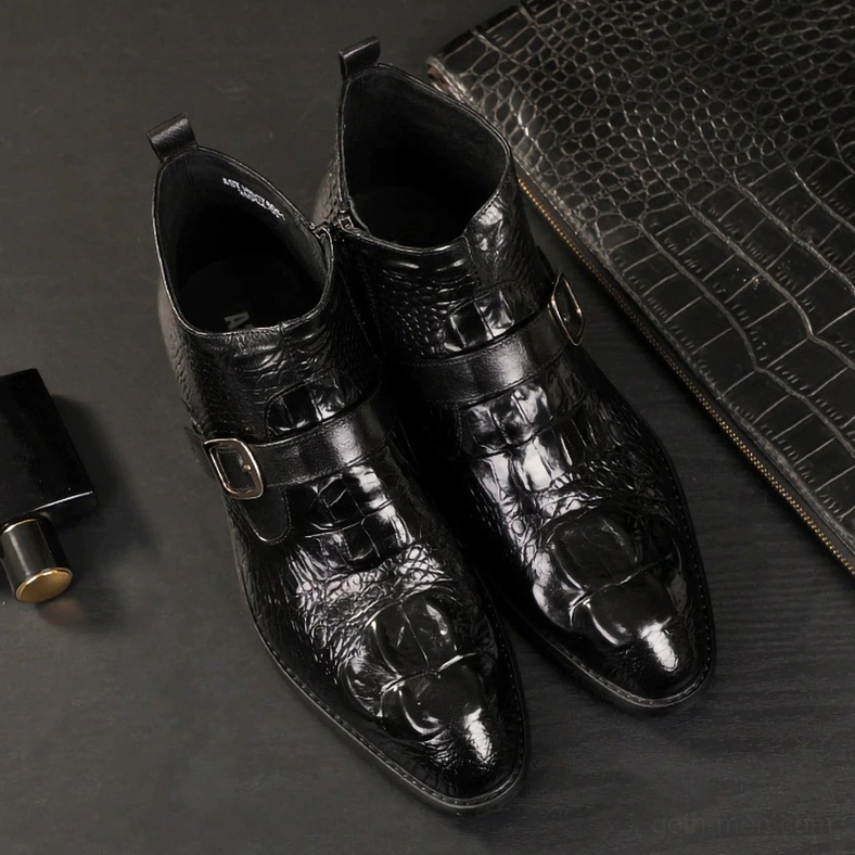 Burgundy gothic crocodile leather boots sole view showing rubber traction design and heel structure