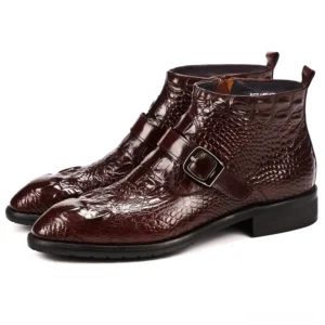 Burgundy crocodile embossed leather gothic boots with metal buckle hardware and polished finish