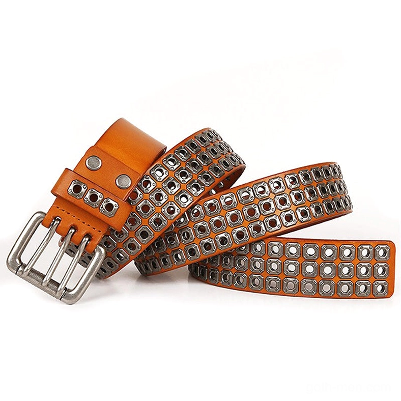 Burnt orange studded leather belt flat lay showing perforated strap ends and single-prong buckle