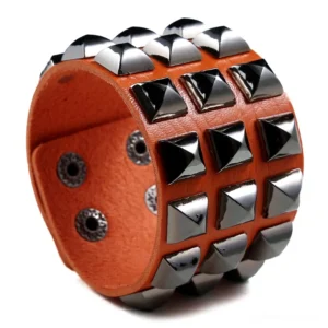 Camel tan studded leather gothic cuff bracelet with metal pyramid studs - side angle detail