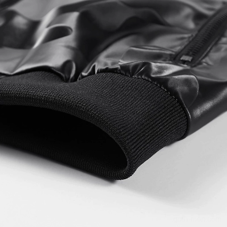 Close-up detail of camouflage PU leather bomber jacket ribbed knit cuff and sleeve construction showing premium material quality