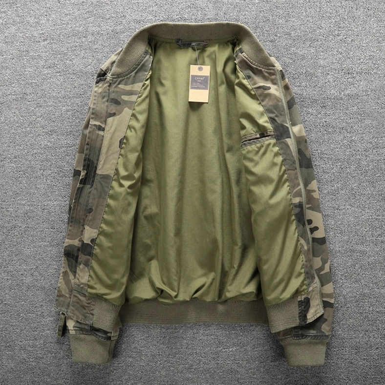Interior lining of camo denim zip jacket showing army green cotton-polyester lining and inner pockets, open front view