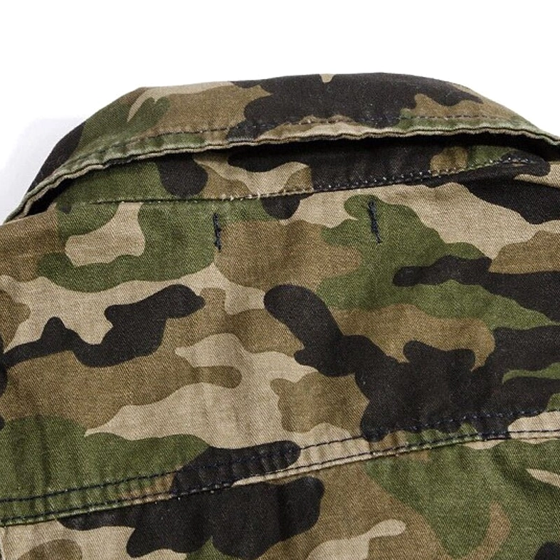 Close-up of geometric camouflage fabric and turn-down collar stitching detail