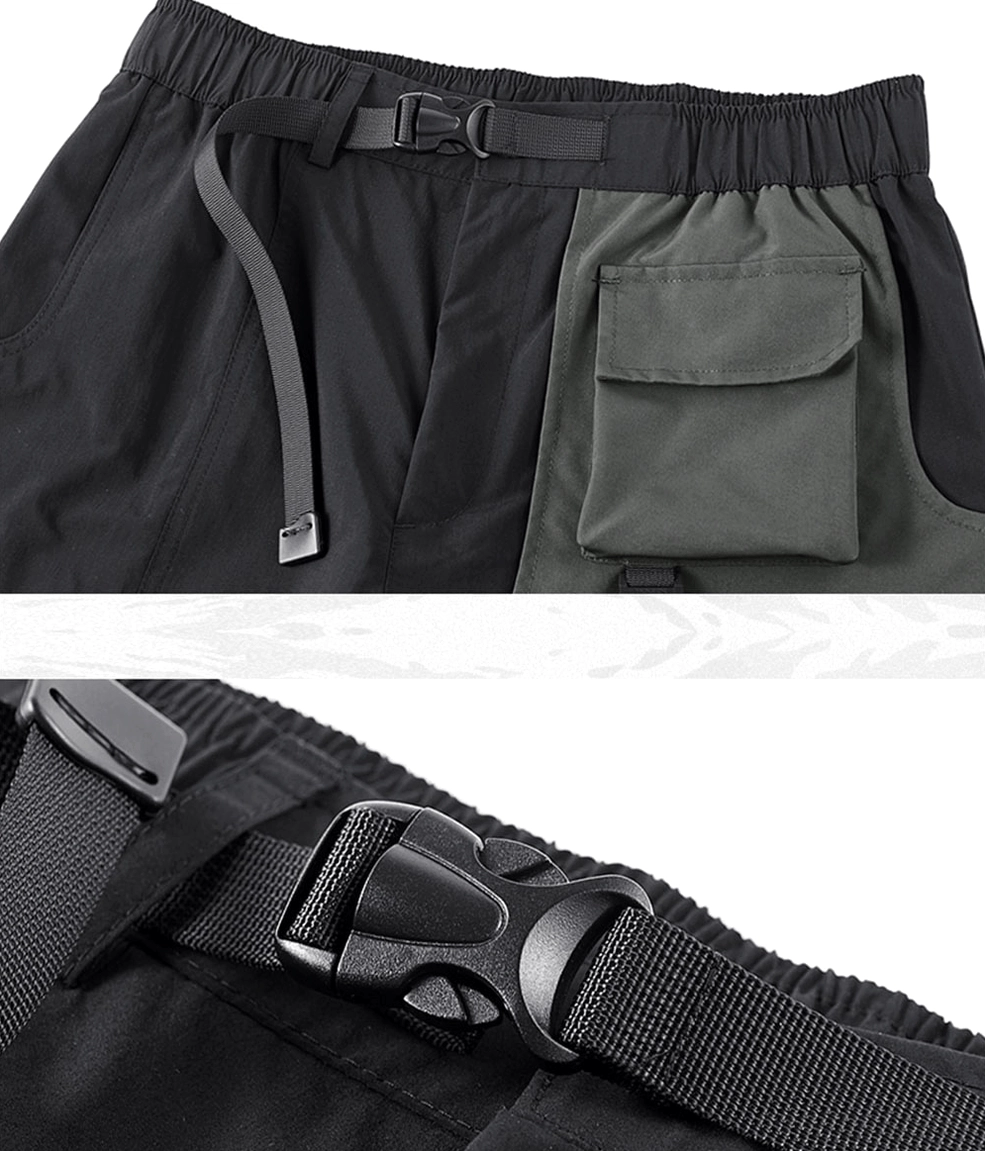 Tactical cargo shorts side waist detail showing quick-release buckle strap and colorblock pocket panel