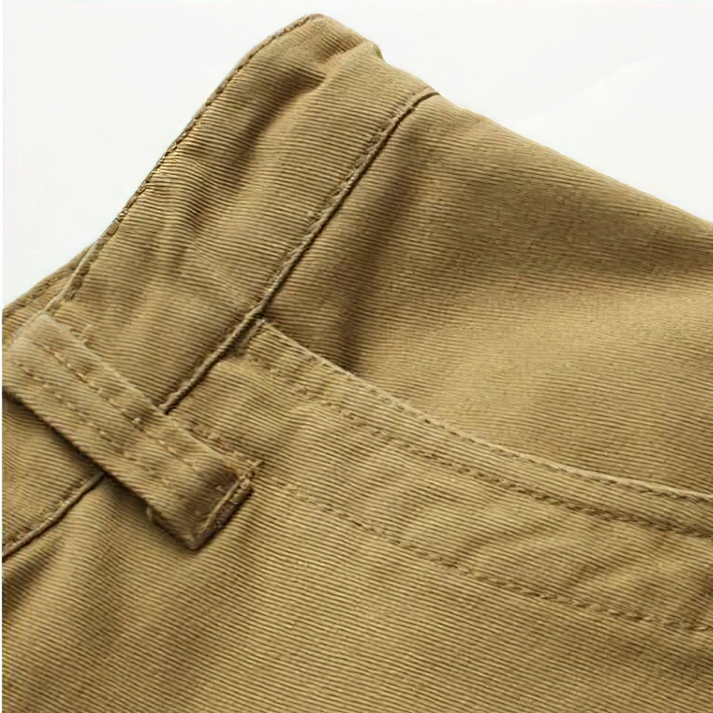 Side view close-up showing belt loop and precision stitching on gothic cargo shorts waist