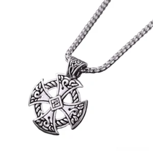 Gothic Celtic cross pendant with wheat link silver chain, side oblique view showing engraved Celtic knotwork patterns