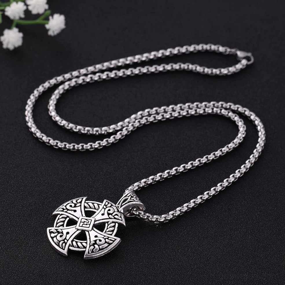 Celtic cross shield pendant necklace showcasing antique silver patina finish and craftsmanship detail