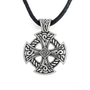 Celtic cross shield pendant necklace with antique silver finish and black braided rope chain, flat lay front view