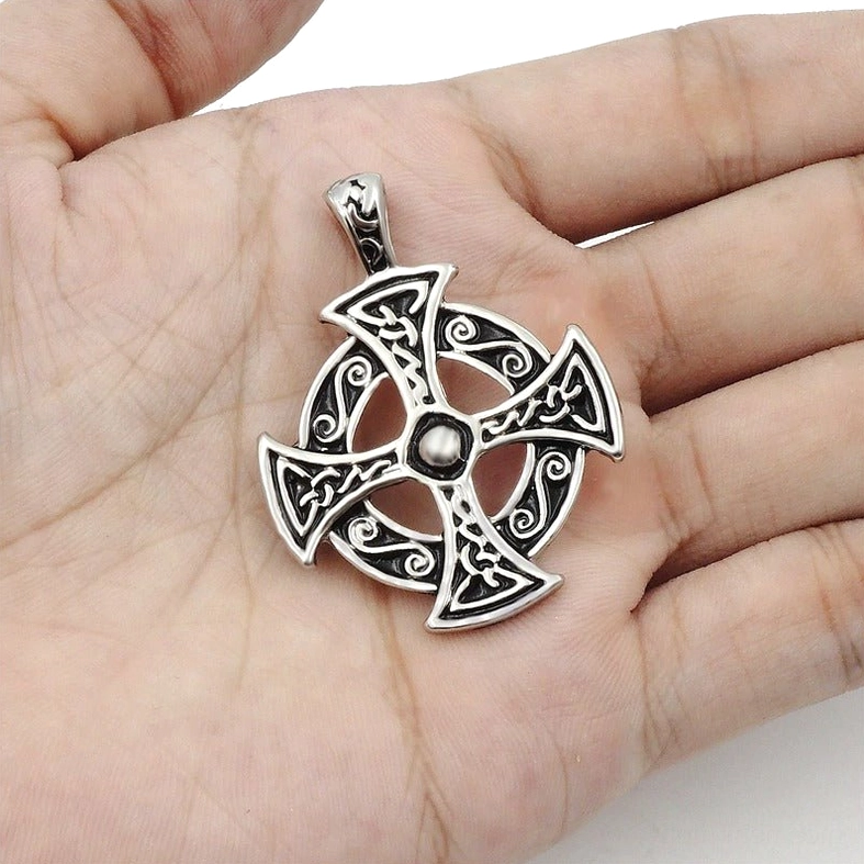 Celtic solar cross pendant with hand size reference closeup gothic symbol detailed carving