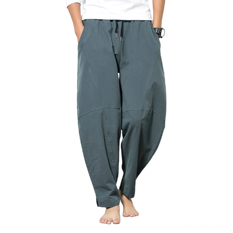 Charcoal gray linen harem pants front view with drawstring waist and panel seams