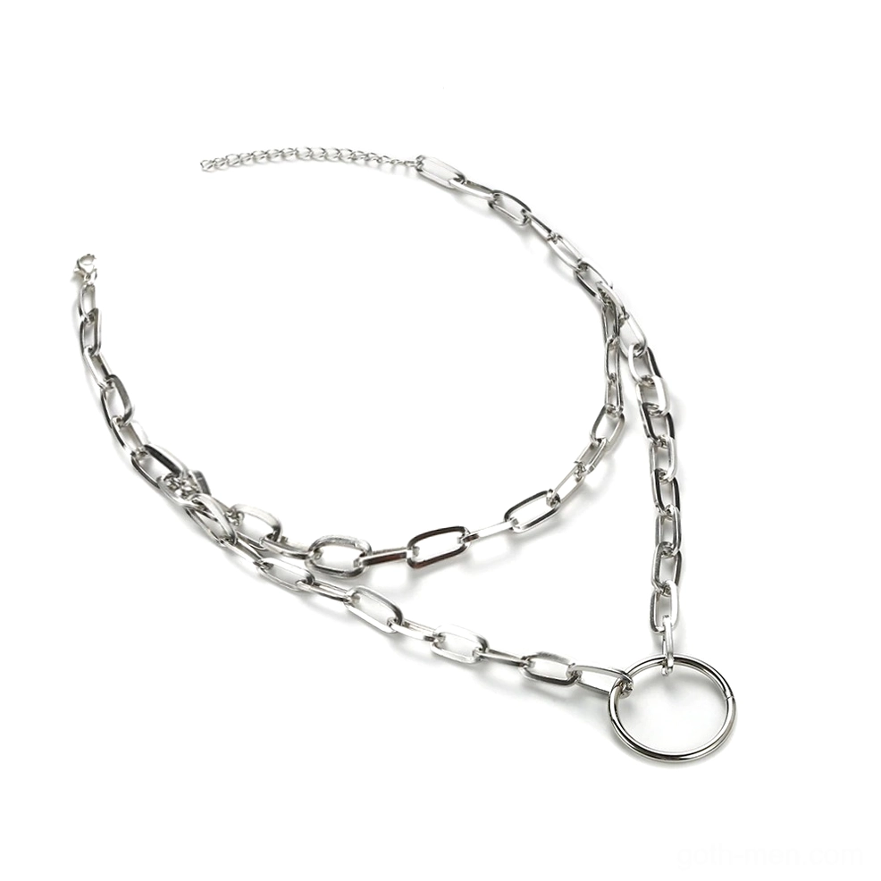 Double layer circle ring pendant necklace flat lay, hollow round charm with silver paperclip chains top-down view