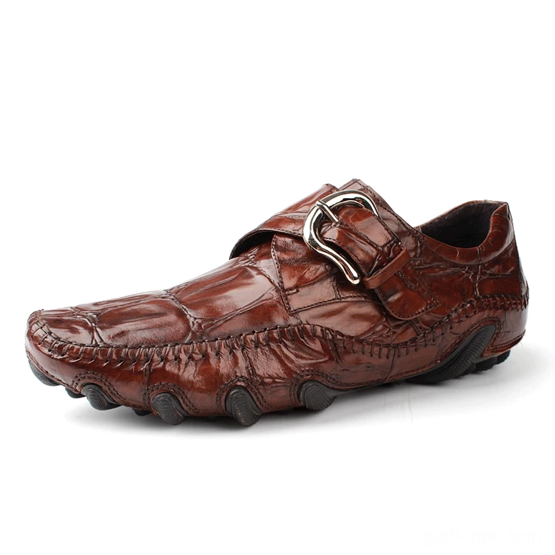 Coffee brown crocodile leather gothic loafers with metal buckle strap, three-quarter angle display