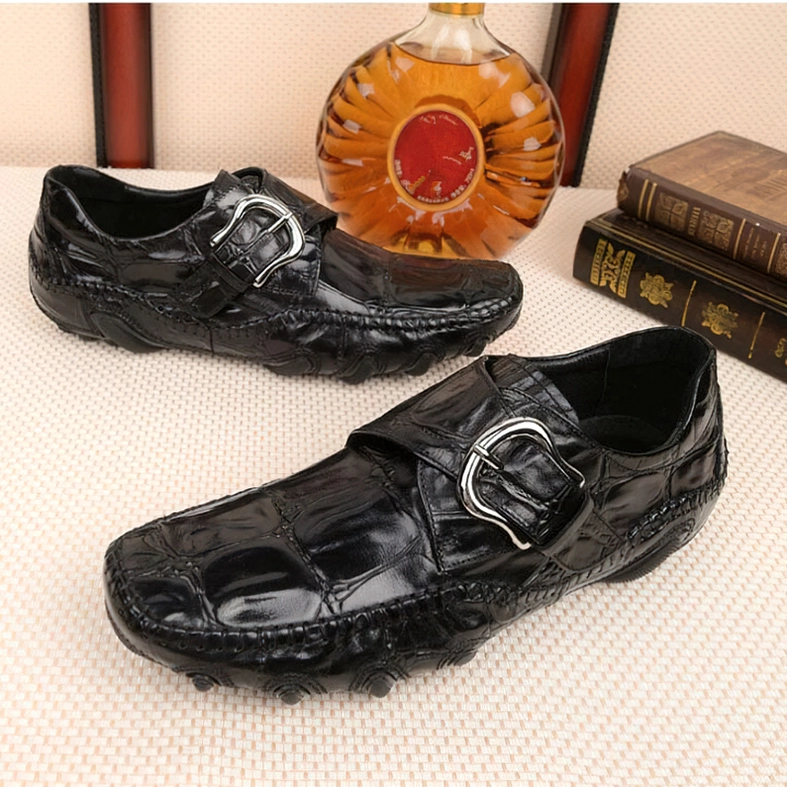 Coffee brown crocodile leather loafers single shoe detailed angle view showing buckle strap design
