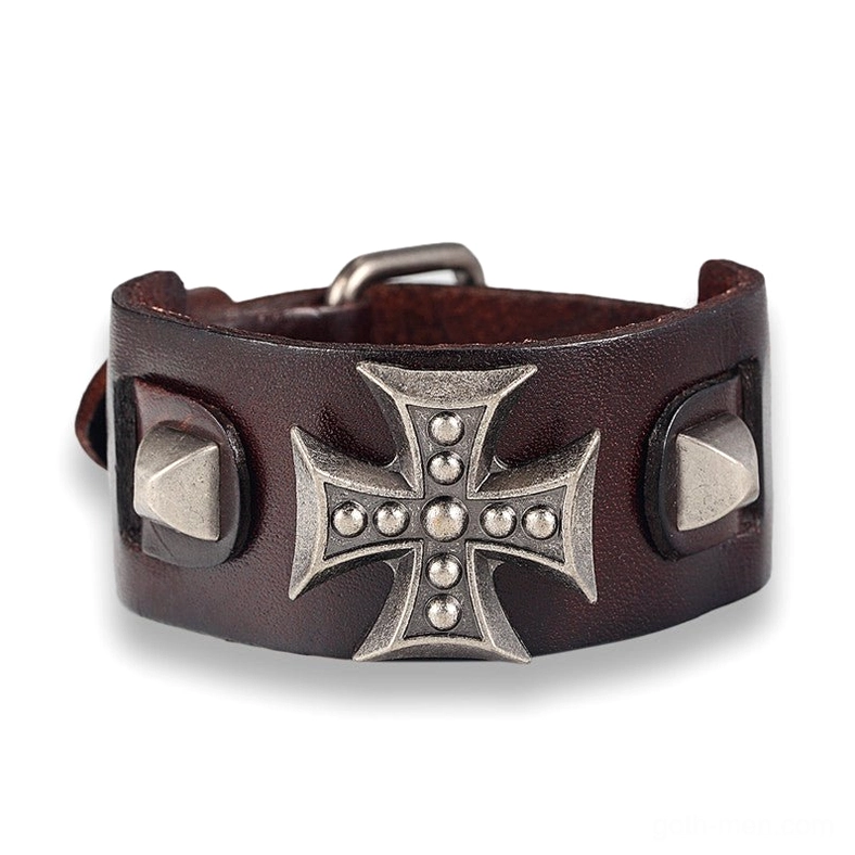 Coffee brown leather gothic cross bracelet flat lay front view featuring metal cross embellishment and studded design