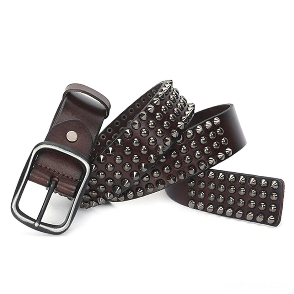 Brown vintage gothic studded belt side flat lay displaying metal stud rows and leather texture