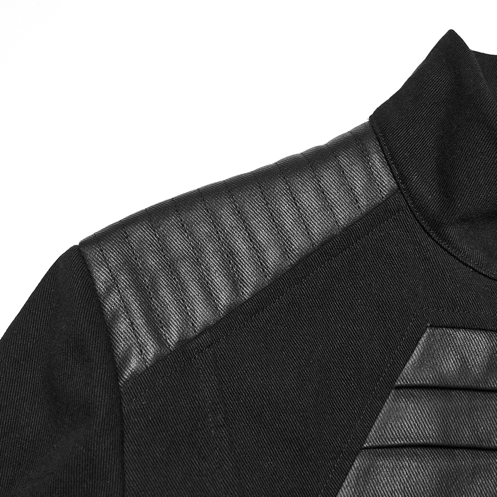 Close-up detail of quilted leather shoulder panel on gothic military jacket showing precision stitching