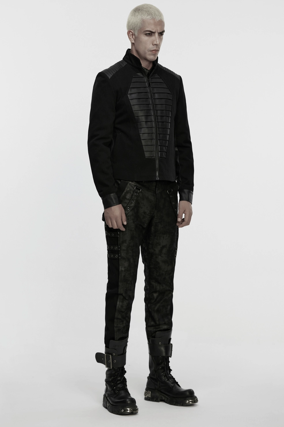 Structured military denim jacket with coffin leather panel emphasizing angular shoulder design