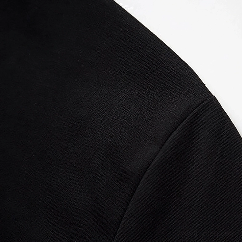 Premium cotton fabric texture close-up, smooth tight-knit weave of black gothic t-shirt