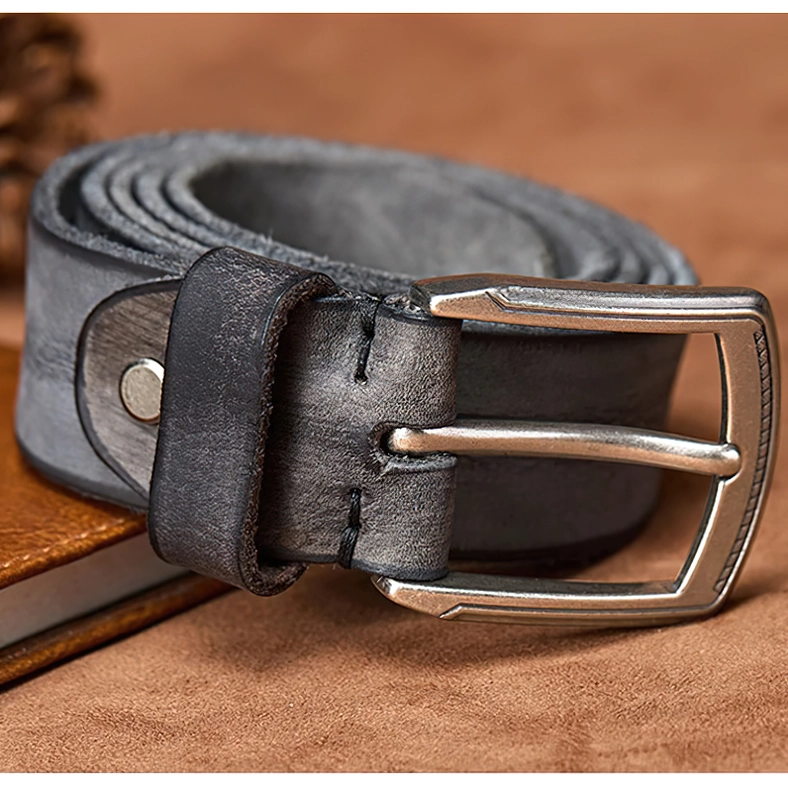 Cowhide gothic belt with antique silver alloy buckle, professional product photography showing belt proportions, leather grain, and alternative aesthetic