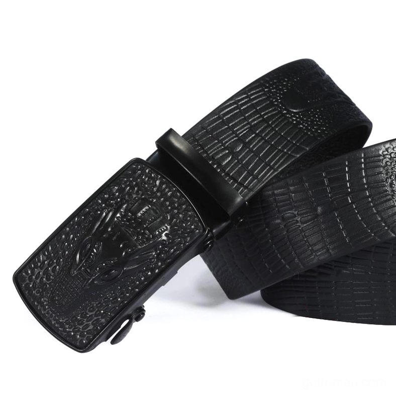 Crocodile texture leather belt with black matte buckle, oblique side view highlighting embossed reptilian grain pattern